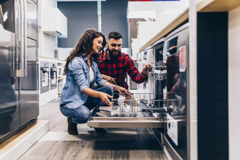 Couple Opening dishwasher